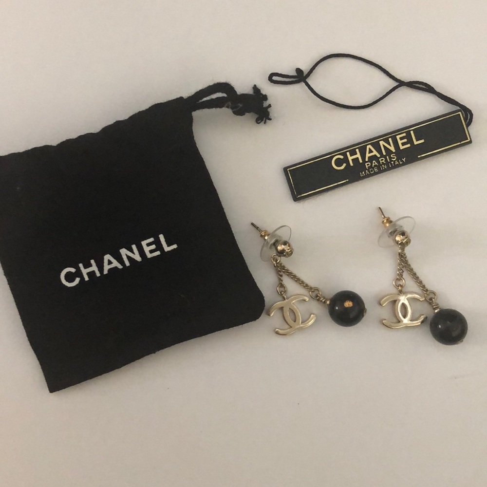 Authentic Chanel gold and black resin earrings